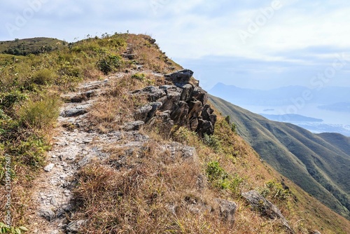 Scenic Mountain Ridge with Hiking Trail and Rocky Terrain