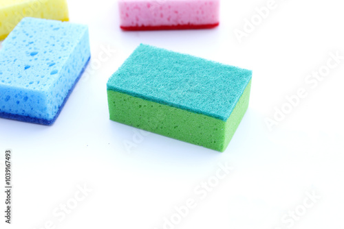 Cleaning kitchen dishwashing sponge. Copy space
