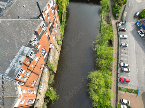 High Angle View of Historical Sheffield City Which is Located at English county of South Yorkshire United Kingdom. Aerial View of City Was Captured with Drone's Camera From High altitude on April 29th photo