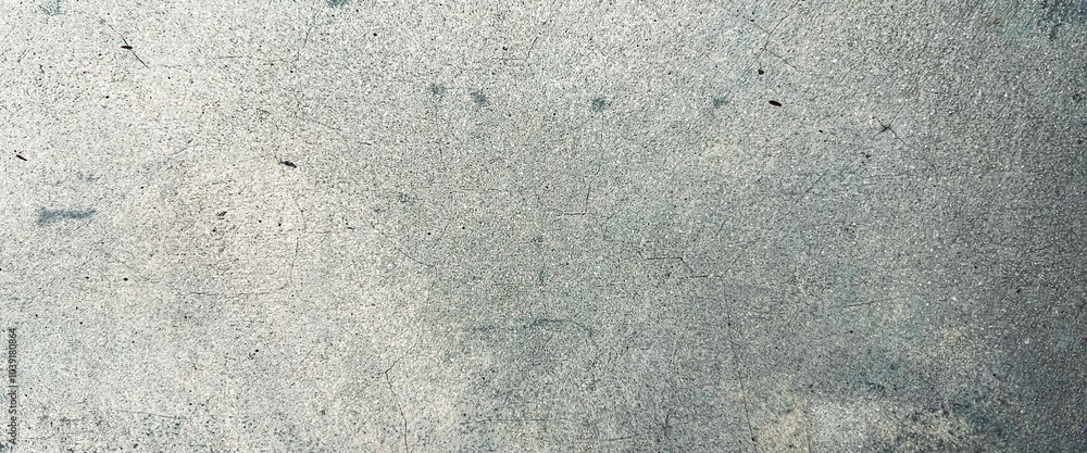 Fototapeta premium Close-up image capturing the detailed texture of a weathered concrete surface. Classic retro texture for poster banner background and other digital needs.
