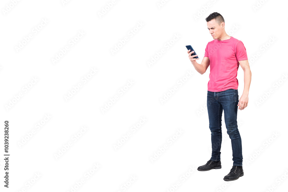 Irritated male reading unpleasant message on smartphone Irritated male reading unpleasant message on smartphone