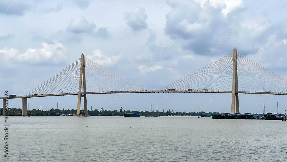 Rach Mieu Cable-Stayed Bridge Spanning Tien River In Mekong Delta, Vietnam. This Bridge Linking The Two Provinces Of Tien Giang And Ben Tre Together. Rach Mieu Cable-Stayed Bridge Spanning Tien River In Mekong Delta, Vietnam. This Bridge Linking The Two Provinces Of Tien Giang And Ben Tre Together.