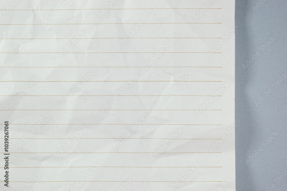 Naklejka premium crumpled line paper texture on grey background, blank sheet notebook