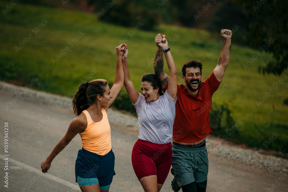 Obraz premium Group of people running outdoors on sunny day, goal-accomplishing concept