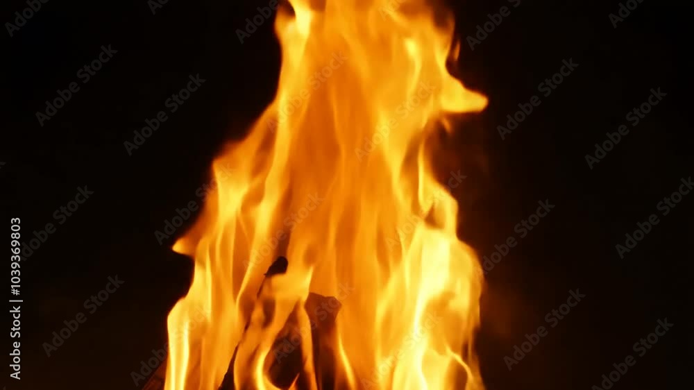 Big torch fire or big campfire fire and flames isolated on black background. slow motion. 4K video Big torch fire or big campfire fire and flames isolated on black background. slow motion. 4K video