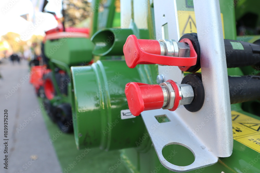 This is a closeup view of vibrant Red Control Knobs found on sophisticated Agricultural Equipment This is a closeup view of vibrant Red Control Knobs found on sophisticated Agricultural Equipment
