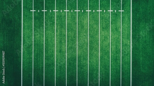 Overhead drone view of a lush green football field with white boundary lines and markings with minimal players scattered for practice or training session