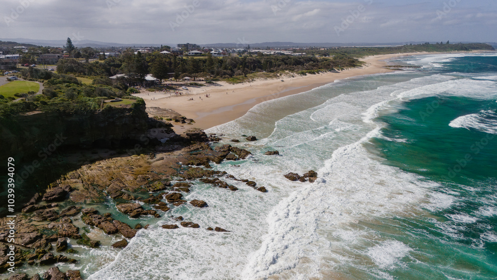 Fototapeta premium Caves beach experiences windy conditions near Swansea in New South Wales.