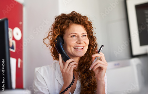 Office, businesswoman and thinking with telephone for communication, networking and chat with contact. Landline, female person and receptionist with call to listening, meeting schedule or admin tasks photo