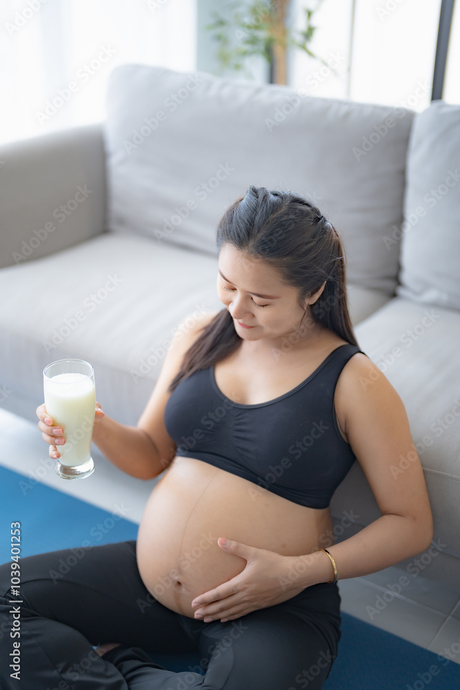 Pregnant asian woman drinking milk at home relaxation and Self-care Pregnancy drinking a glass of fresh milk mother mindfulness Positive life moment in pregnancy time Pregnant asian woman drinking milk at home relaxation and Self-care Pregnancy drinking a glass of fresh milk mother mindfulness Positive life moment in pregnancy time