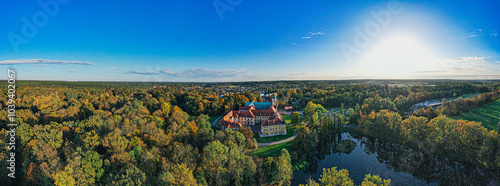 Obraz na płótnie Panorama Opactwa Cystersów w Rudach, romańsko–gotyckie opactwo w Rudach w powiecie raciborskim, w województwie śląskim, z pięknym parkiem jesienią z lotu ptaka w salonie