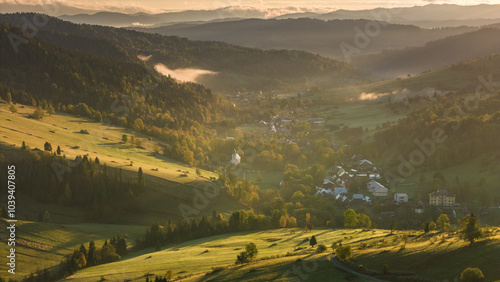 Fototapeta Naklejka Na Ścianę i Meble -  Drone Captures Autumn Beauty in the Countryside Under Poland's Tatra Mountain Range