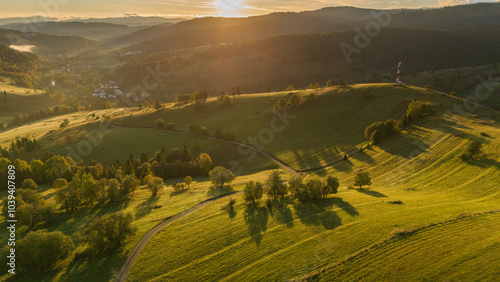 Fototapeta Naklejka Na Ścianę i Meble -  Drone Captures Autumn Beauty in the Countryside Under Poland's Tatra Mountain Range