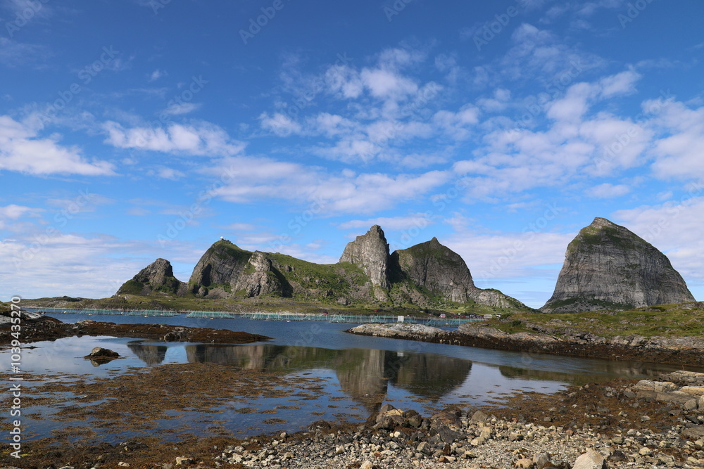 Fototapeta premium View of the fantastic rocks of the Sorsannaan Island reflected in the sea, Norway