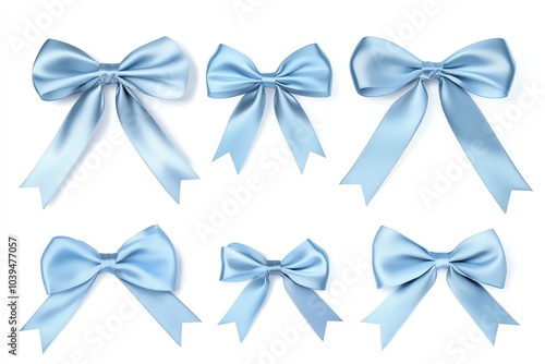 Various blue satin bows on a white isolated background.