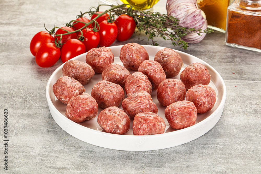 Uncooked raw beef meatball minced Uncooked raw beef meatball minced