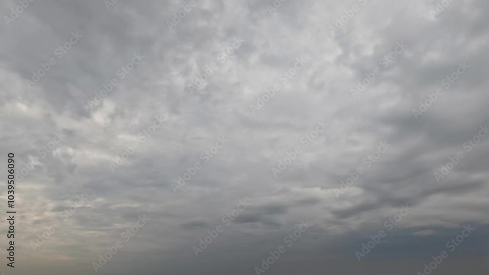 timelapse of the sky with gray rain or snow clouds - loop video timelapse of the sky with gray rain or snow clouds - loop video