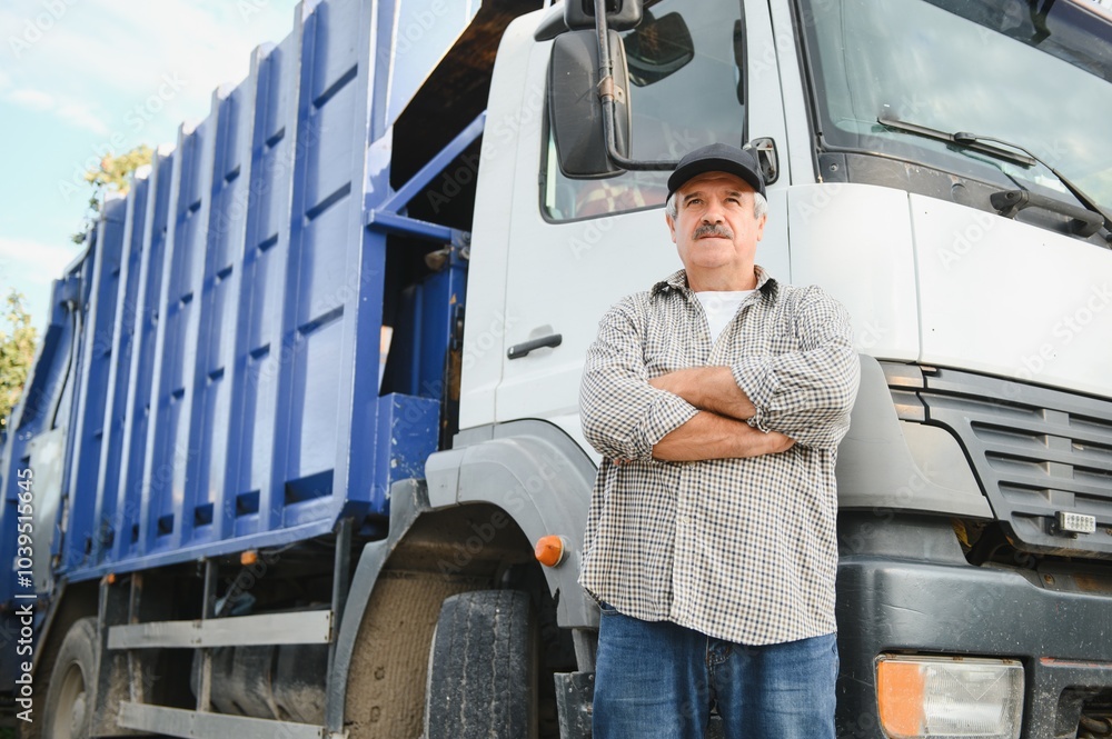Portrait of a male garbage truck driver Portrait of a male garbage truck driver