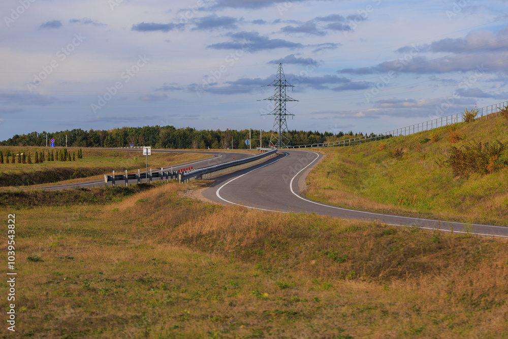 Wide road, highway, sun and blue sky on a summer day. Wide road, highway, sun and blue sky on a summer day.
