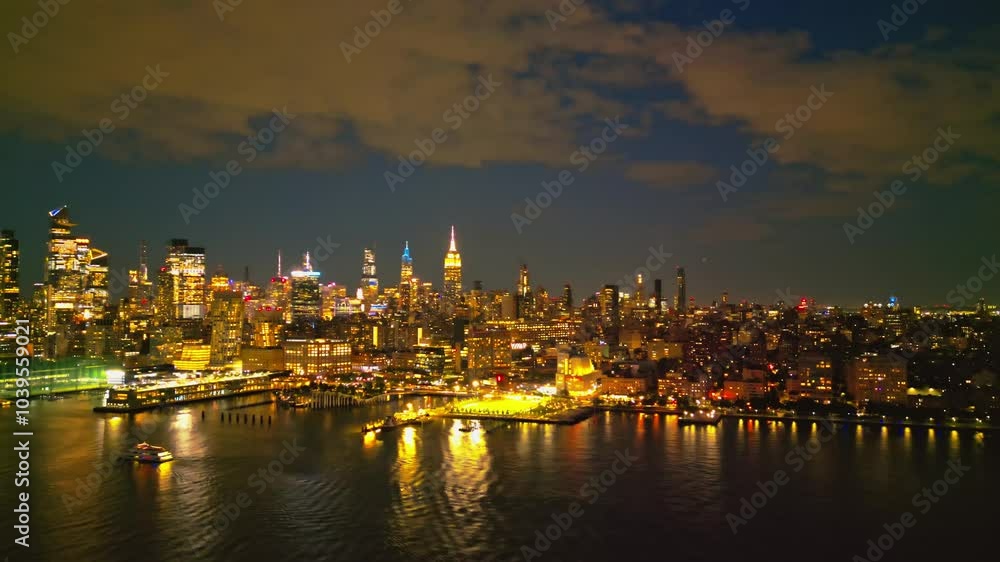 New York City Skyline at dusk night aerial view. NYC near night from drone. New York City skyline, cityscape of Manhattan in USA. Panoramic aerial view on Manhattan at night. Travel in USA. New York City Skyline at dusk night aerial view. NYC near night from drone. New York City skyline, cityscape of Manhattan in USA. Panoramic aerial view on Manhattan at night. Travel in USA.