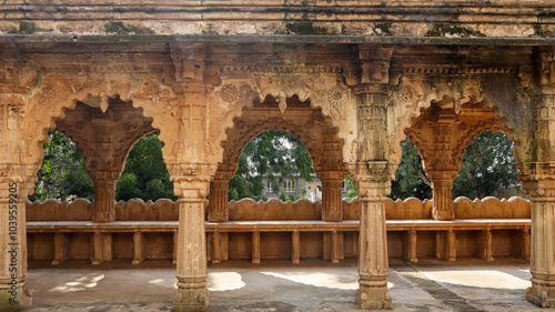 View of the carved arches of the courtyard of Naulakha Palace, Gondal, Rajkot, Gujarat, India. photo