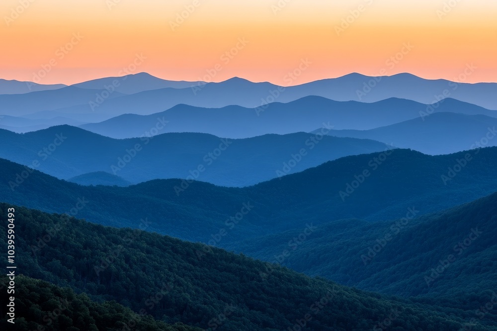 Fototapeta premium A peaceful scene unfolds as dawn breaks over misty mountains, casting a serene and tranquil atmosphere that heralds the promise of a new day with stunning views.