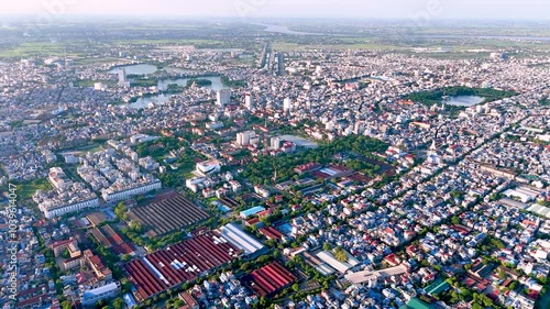 Aerial view of Nam Dinh city with many houses, buildings and lakes