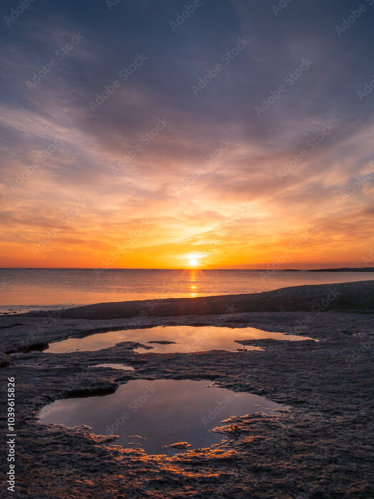 Sunrise Over the Sea with Reflection in Tidal Pool Sunrise Over the Sea with Reflection in Tidal Pool