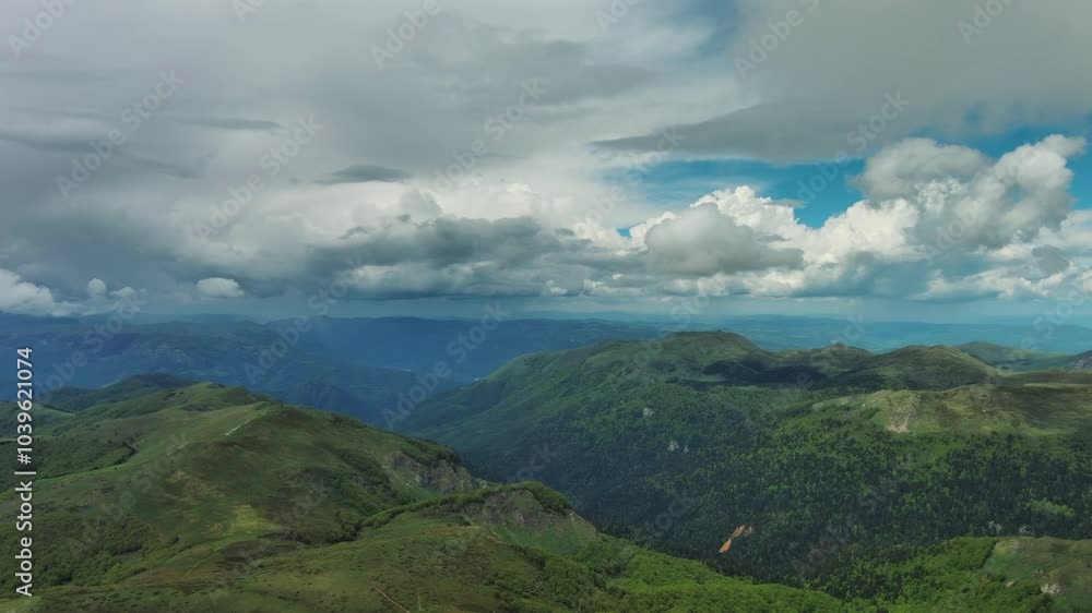 Aerial view of clouds over summer green mountains landscape, Montenegro, panorama 4k Aerial view of clouds over summer green mountains landscape, Montenegro, panorama 4k