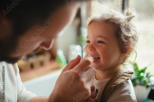 Foto Sick girl with cold at home has stuffy nose