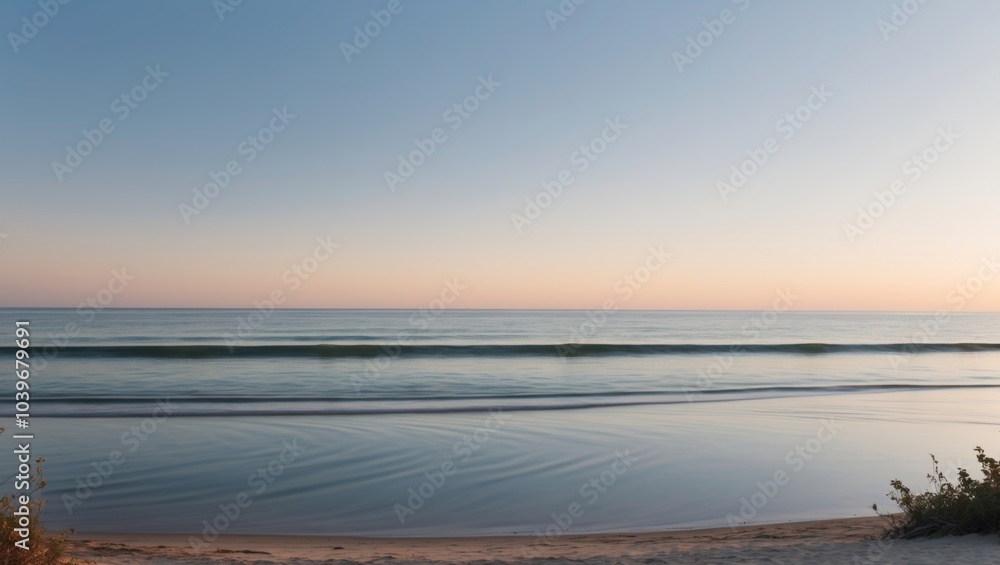 Obraz premium Tranquil Beach at Sunset Over Water Waves.