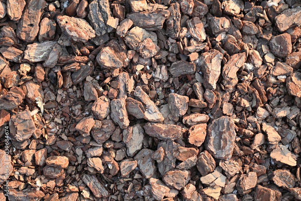 texture of bark pieces as ground cover, bark pieces covering the surface, brown bark close-up texture of bark pieces as ground cover, bark pieces covering the surface, brown bark close-up
