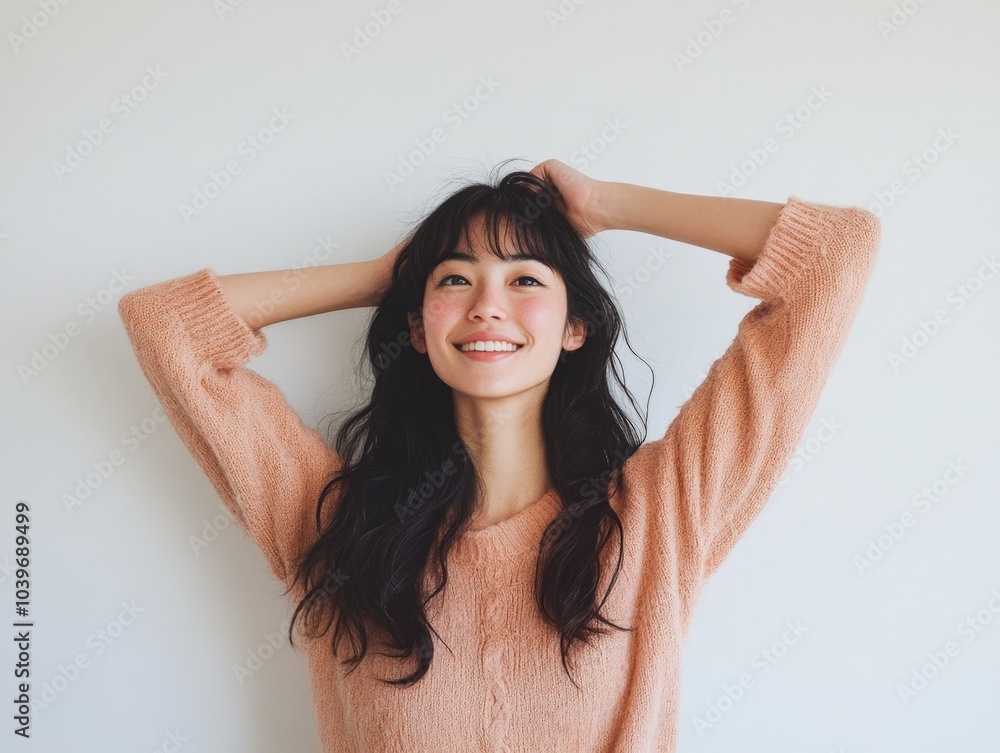 Fototapeta premium Young Japanese Woman Stretching Her Arms