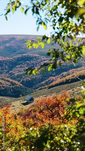  A hut in the mountains on an autumn day