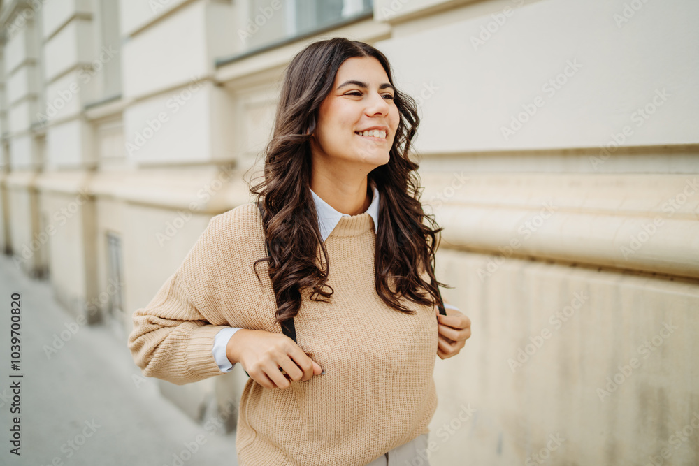 Young caucasian smiling woman student going to university Young caucasian smiling woman student going to university