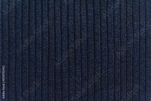 abstract background of dark blue cashmere knit fabric texture close up