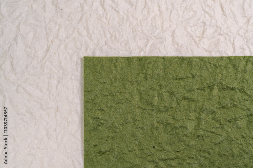 Fototapeta premium Colorful background material of green and white Japanese paper