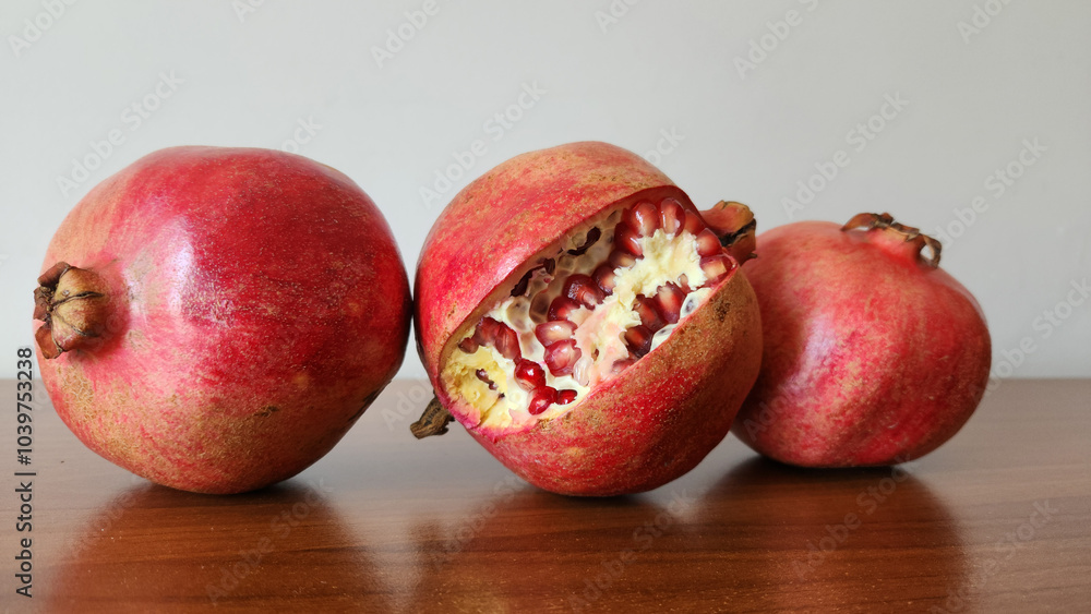 Pomegranates as a delicious fruit in autumn Pomegranates as a delicious fruit in autumn