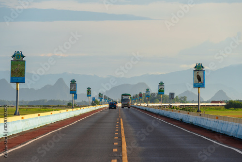 The longest road bridge at Thale Noi lake in Phatthalung Province, Thailand photo