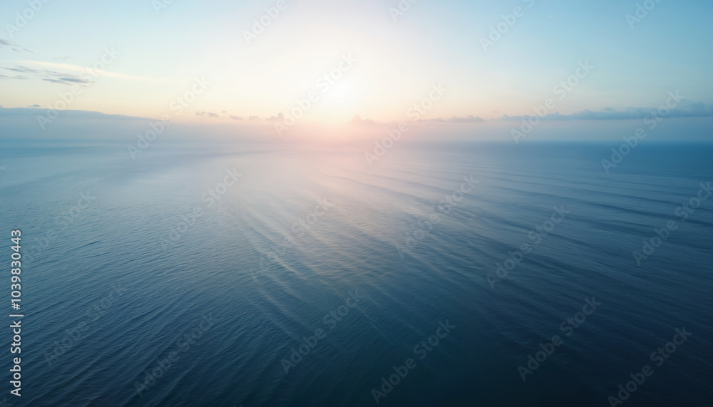 Fototapeta premium Stunning ocean sunset over calm waters