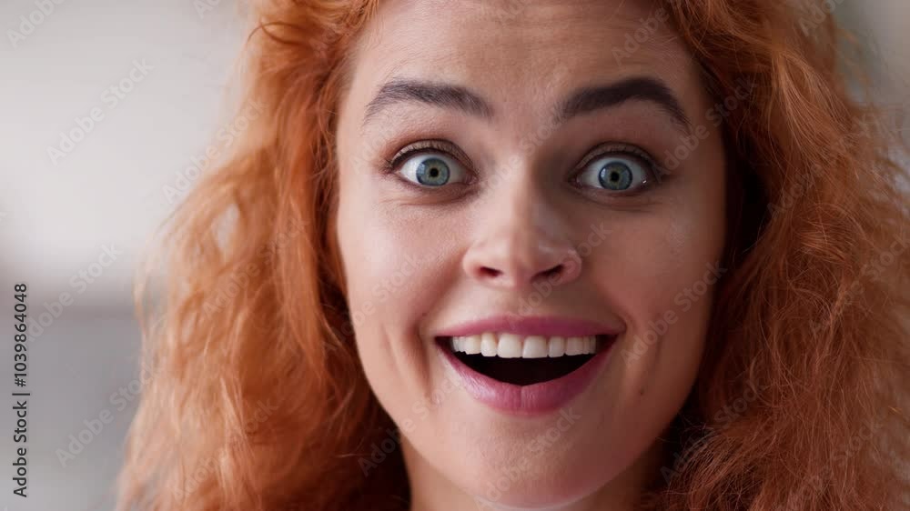 Close up Caucasian woman amazed wonder surprised happy face excited winner emotional girl portrait lady looking at camera with big eyes open mouth shock win victory achieve good news female at home Close up Caucasian woman amazed wonder surprised happy face excited winner emotional girl portrait lady looking at camera with big eyes open mouth shock win victory achieve good news female at home