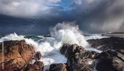 Powerful Ocean Waves Crashing Against Cliff Stones