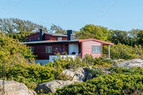 Obraz na płótnie Colorful Wooden House by the Sea on a Fjord in Sandefjord, Norway w salonie
