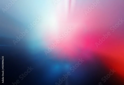 A blurred background with shades of blue, pink, and red, creating a soft and abstract design.