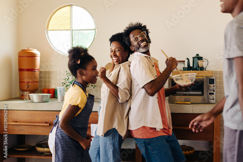 Family bonding in the kitchen: Mixing flour and making memories