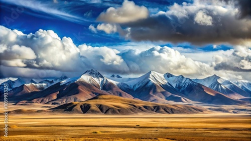 Close-up shot of the majestic Imperial mountains and fluffy clouds in Tibet's Qinghai province photo