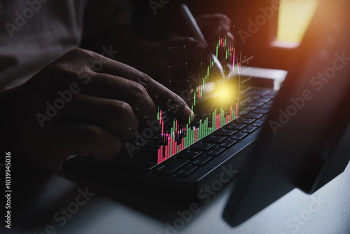 Stock trader analyzing stock graph, Investor investment, Stock Market, Businessman or trader is showing a growing virtual hologram stock, Trading concept, Planning and strategy, Business growth