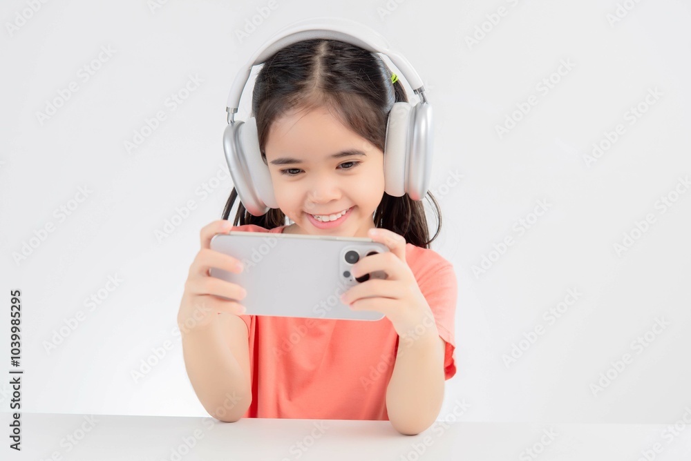 asia cute Girl playing game on a smartphone. asia cute Girl playing game on a smartphone.