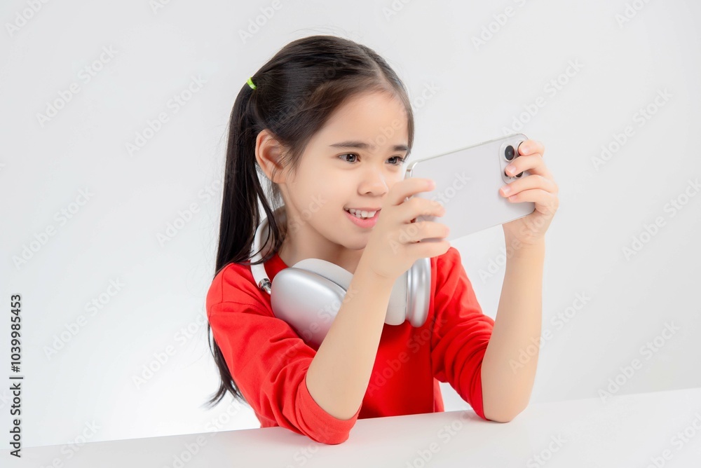 asia cute Girl playing game on a smartphone. asia cute Girl playing game on a smartphone.