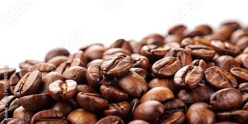 Coffe beans on white background with shallow depth of field in medium shot